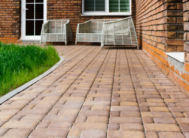 The durable and weather-resistant nature of the concrete blocks makes them an ideal choice for outdoor walkways, patios, and public gathering spaces.